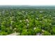 Serene neighborhood seen from above, dotted with lush trees and inviting homes at 4410 N Pennsylvania St, Indianapolis, IN 46205