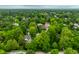 Expansive aerial view of the residential neighborhood with mature trees at 4410 N Pennsylvania St, Indianapolis, IN 46205