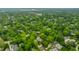 Aerial image shows lush, green neighborhood highlighting the property's location and surrounding community at 4410 N Pennsylvania St, Indianapolis, IN 46205