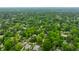 Overhead image of a neighborhood surrounded by trees, with a focus on the property's surroundings at 4410 N Pennsylvania St, Indianapolis, IN 46205
