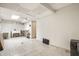 Spacious basement featuring tile flooring, white walls, and a utility sink at 4410 N Pennsylvania St, Indianapolis, IN 46205
