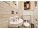 Charming bathroom features a classic sink, tile details, and vintage-inspired design at 4410 N Pennsylvania St, Indianapolis, IN 46205
