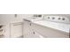 Laundry room featuring updated washer and dryer units at 4410 N Pennsylvania St, Indianapolis, IN 46205