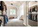Spacious walk-in closet with custom shelving and ample storage for clothes and accessories at 4410 N Pennsylvania St, Indianapolis, IN 46205