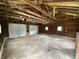 Spacious garage interior with exposed rafters and two-car capacity at 453 Illinois St, Fortville, IN 46040