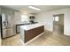 Modern kitchen with stainless steel appliances, island, and a bright, inviting atmosphere at 453 Illinois St, Fortville, IN 46040