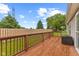 Spacious back deck with wooden railings overlooking the backyard at 4907 Franklin Villas Pl, Indianapolis, IN 46237
