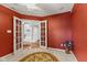 Spacious room with French doors, offering an open view and access to the rest of the house at 4907 Franklin Villas Pl, Indianapolis, IN 46237