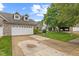 Charming home with green lawn and driveway at 4907 Franklin Villas Pl, Indianapolis, IN 46237