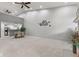 Spacious living room featuring vaulted ceilings, recessed lighting, and neutral carpet at 4907 Franklin Villas Pl, Indianapolis, IN 46237