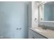 Bright bathroom with a gray countertop, vanity, and wall cabinet at 522 E County Road 1000 S, Clayton, IN 46118