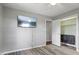 Bedroom with a TV on the wall and closet with open doors provides ample storage at 522 E County Road 1000 S, Clayton, IN 46118