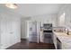 Bright kitchen with stainless steel appliances, and modern cabinetry at 522 E County Road 1000 S, Clayton, IN 46118
