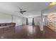 Spacious living room with ceiling fans, lots of natural light, and modern flooring at 522 E County Road 1000 S, Clayton, IN 46118