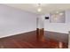 Open-concept living room with hardwood floors and recessed lighting at 5305 Adrian Orchard Dr, Indianapolis, IN 46217