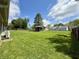 Expansive backyard featuring a wooden gazebo, providing ample space for outdoor activities and relaxation at 539 Willow Dr, Danville, IN 46122