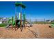 Well-equipped playground with multiple slides, climbing frames, and swing sets for community children at 5533 Tart Blvd, Indianapolis, IN 46239