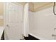 Full bathroom features white tile surround, dark vanity, and a new shower door at 5554 Jona Way, Bargersville, IN 46106