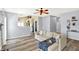 Cozy living room featuring hardwood floors and seamlessly connecting to the kitchen at 5554 Jona Way, Bargersville, IN 46106
