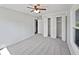 Neutral bedroom with soft carpet, ceiling fan, and closet for storage at 616 W Michigan St, Greenfield, IN 46140