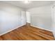 Spacious bedroom with two closets, wood floors, and neutral colors at 616 W Michigan St, Greenfield, IN 46140