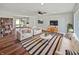 Bright living room featuring modern furniture, hardwood floors, and an open layout at 616 W Michigan St, Greenfield, IN 46140