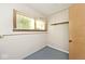 The basement features concrete block walls and a window at 6248 Graham Rd, Indianapolis, IN 46220