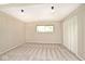 Bedroom with neutral carpet, white walls, and closet at 6248 Graham Rd, Indianapolis, IN 46220