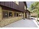 Expansive deck with stone accents and wood siding, offering an inviting space for relaxation and entertainment at 6248 Graham Rd, Indianapolis, IN 46220