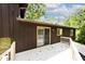 Exterior view showcasing a spacious white deck, perfect for enjoying the surrounding nature and outdoor living at 6248 Graham Rd, Indianapolis, IN 46220