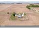 Overhead shot of a complete farm including residence, silos, and outbuildings surrounded by acres of open farmland at 671 W 350 N, Shelbyville, IN 46176