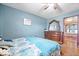 Comfortable bedroom with dresser and mirror at 671 W 350 N, Shelbyville, IN 46176