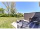 Inviting backyard patio with comfortable seating, perfect for outdoor gatherings and enjoying the serene landscape at 6832 Oakcrest Dr, McCordsville, IN 46055