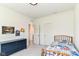 Comfortable ' bedroom with a single bed, dresser, and bright window creating a cozy atmosphere at 6832 Oakcrest Dr, McCordsville, IN 46055