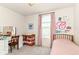 Cozy ' bedroom featuring a single bed, dresser, and playful decor, perfect for a retreat at 6832 Oakcrest Dr, McCordsville, IN 46055