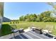 Cozy patio featuring outdoor seating and lush green space, ideal for relaxing and entertaining guests at 6832 Oakcrest Dr, McCordsville, IN 46055