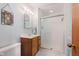 Bright bathroom with a shower and modern vanity sink at 7135 Huntington Rd, Indianapolis, IN 46240