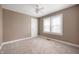 Bright bedroom featuring plush carpeting, a ceiling fan, and great natural light at 732 S Biltmore Ave, Indianapolis, IN 46241