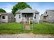 Charming exterior view of a cozy one-story home with a well-maintained lawn and an inviting entrance at 732 S Biltmore Ave, Indianapolis, IN 46241