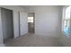A spacious bedroom with ample natural light, neutral colors, and a walk-in closet at 7323 Waylon Way, Indianapolis, IN 46239