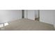 Bedroom showcasing neutral carpet, natural light, and doorway leading to bathroom at 7323 Waylon Way, Indianapolis, IN 46239