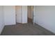 Neutral bedroom with views into entryways and open closet space at 7329 Waylon Way, Indianapolis, IN 46239