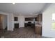 Open kitchen with modern appliances, ample counter space, and a spacious layout at 7329 Waylon Way, Indianapolis, IN 46239
