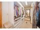 Walk-in closet with custom shelves and rods for organized storage at 806 Maplewood Ave, Anderson, IN 46012