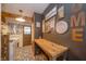 Functional laundry room with modern appliances, stylish floors, and counter space at 806 Maplewood Ave, Anderson, IN 46012