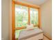 Bright window seat overlooking the backyard at 806 Maplewood Ave, Anderson, IN 46012