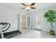 Bonus room features a ceiling fan and access to two outdoor areas at 8218 San Carlos Ct, Indianapolis, IN 46256