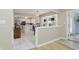 Bright eat-in kitchen features white cabinets, stainless steel appliances, and large windows at 8218 San Carlos Ct, Indianapolis, IN 46256