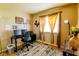 Functional office with a large window, desk, ergonomic chair, and ample space for work and creativity at 8362 Punto Alto Dr, Indianapolis, IN 46227