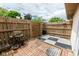 Fenced in patio area with brick pavers and a black and white tiled area at 8362 Punto Alto Dr, Indianapolis, IN 46227